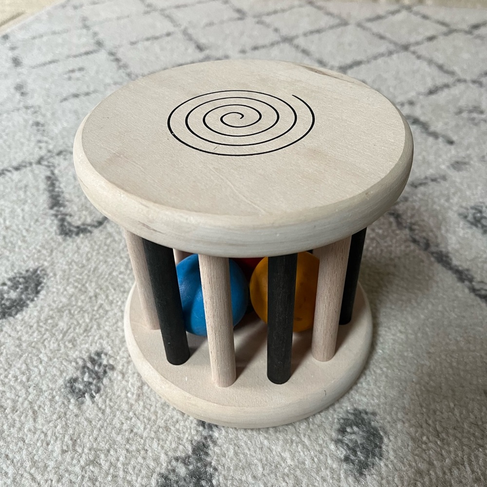 Grimm’s Monochrome Wooden Rolling Toy